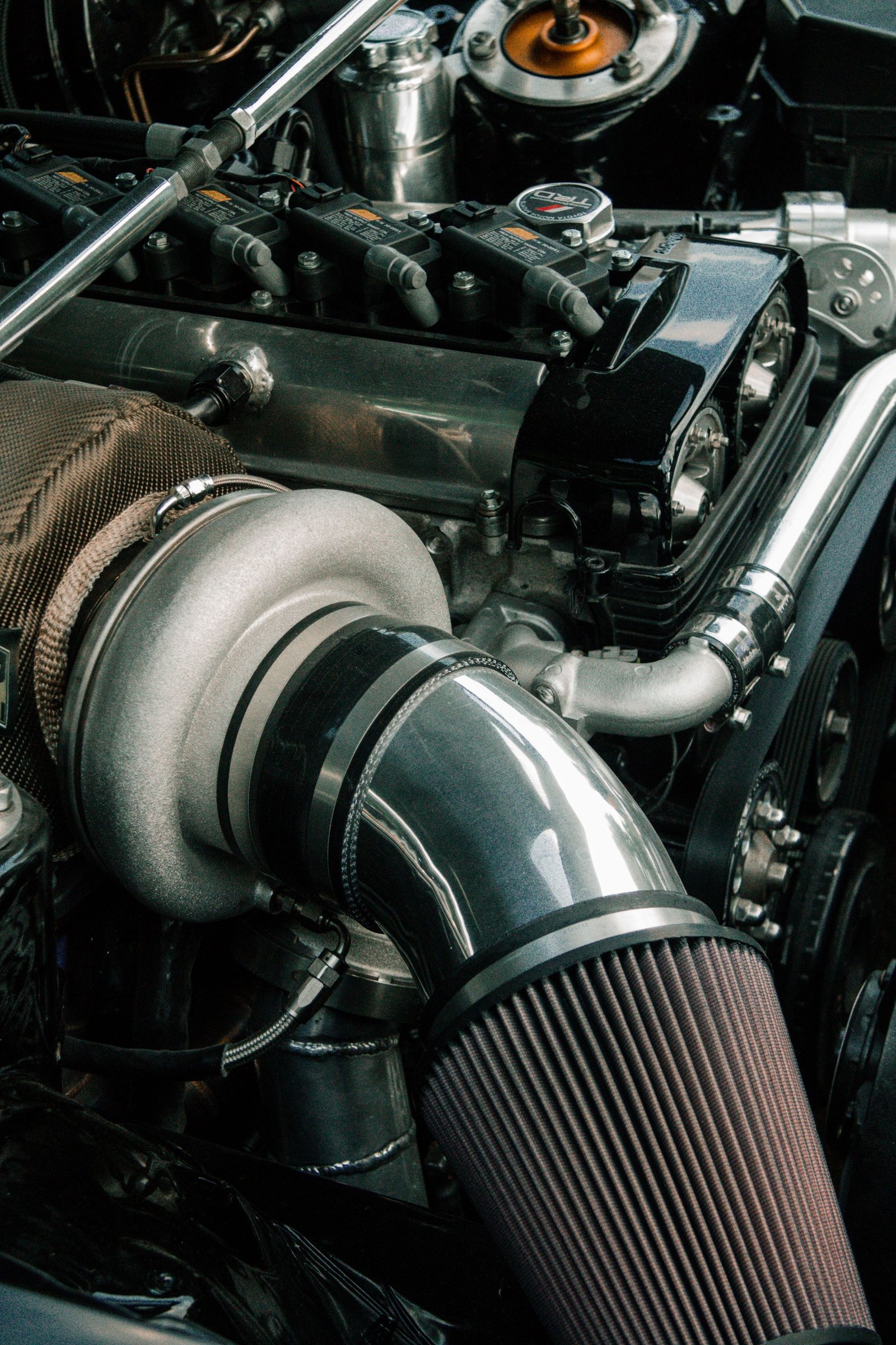View of a car engine bay (stock photo, illustrative)