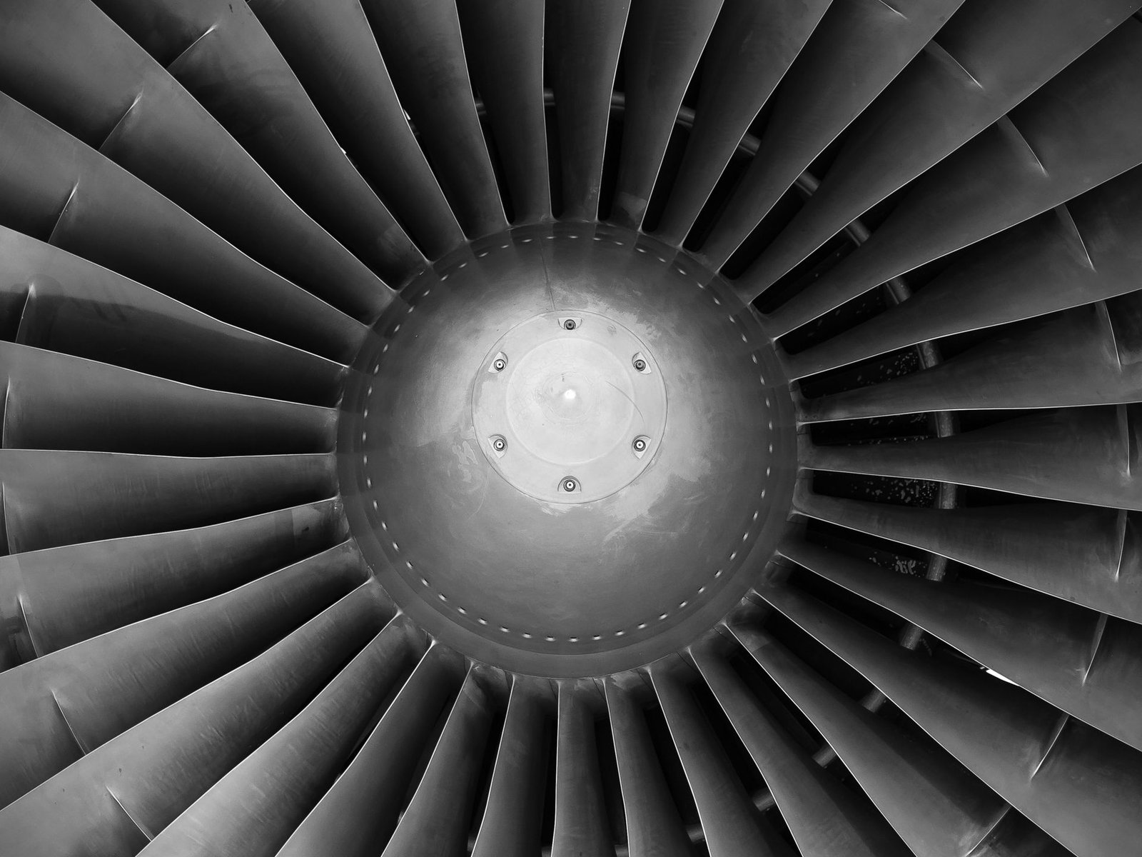 Close-up of a jet engine turbine fan (stock photo, illustrative)