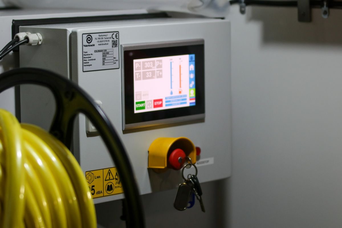 Industrial control cabinet with display, emergency stop and cable entry (stock photo, illustrative)